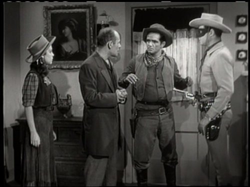 Clayton Moore, John Cliff, Margaret Kerry, and George Lynn in The Lone Ranger (1949)