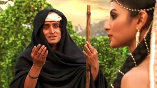 Kumar Hegde and Mouni Roy in Daksh gets a terrible shock (2011)