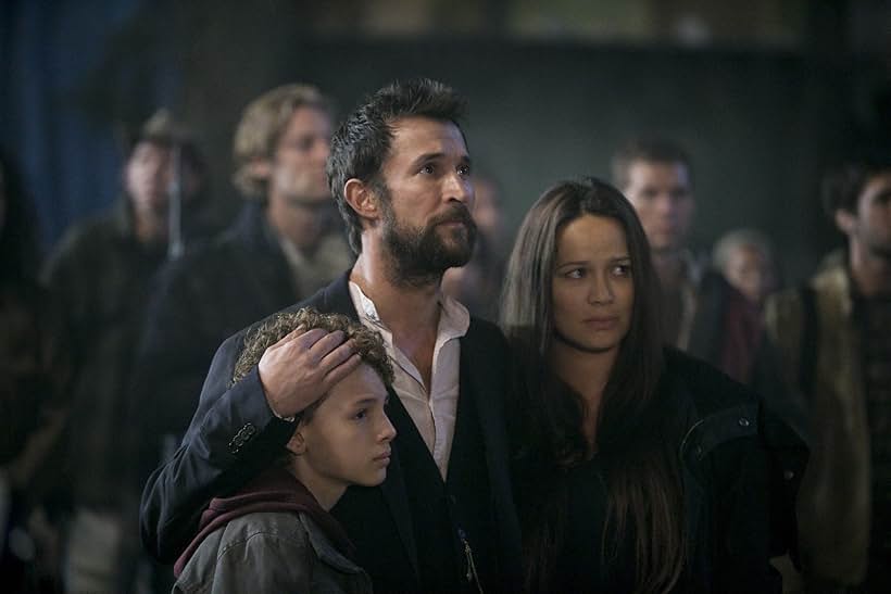 Noah Wyle, Moon Bloodgood, and Maxim Knight in Falling Skies (2011)