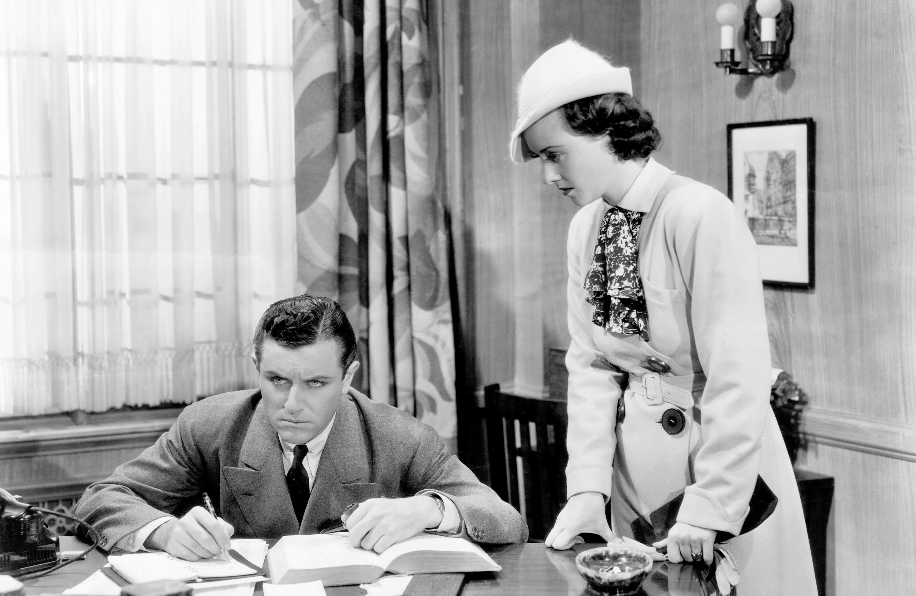 Warren Hull and Margaret Lindsay in The Law in Her Hands (1936)