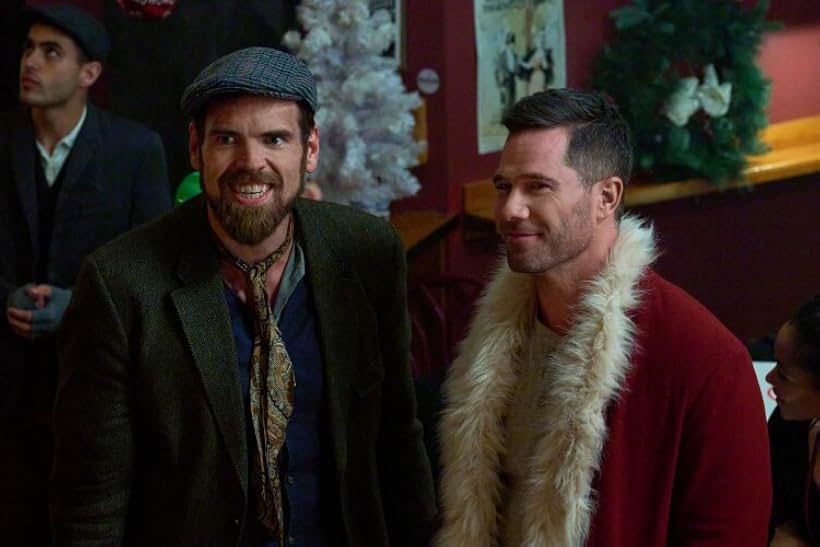 Luke Macfarlane and Matt Willis in Catch Me If You Claus (2023)