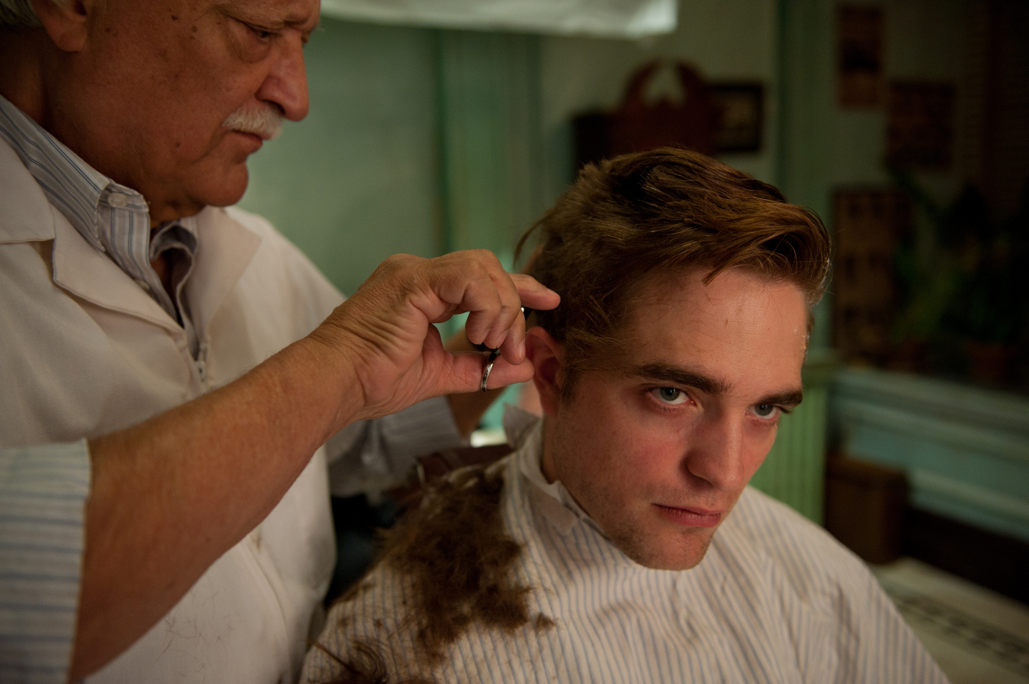 George Touliatos and Robert Pattinson in Cosmopolis (2012)