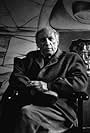 Pablo Picasso sitting in his studio, circa 1950. Modern silver gelatin, 14x11. $600 © 1978 Sanfrod Roth / LACMA MPTV