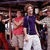 (L-R) Brandon (Greg Siff, in red), Justin (Justin Guarini) and Eddie (Brian  Dietzen) enjoy Spring Break in Miami (Background dancer at left Brandon Henschel). 