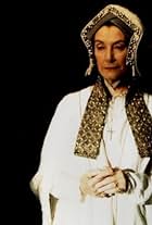 Jean Marsh plays a ghostly amalgamation of Henry VIII's past wives, visiting the sickly Monarch shortly before his death.