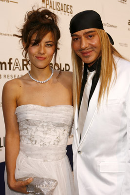 John Galliano and Mylène Jampanoï