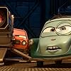 Joe Mantegna and Thomas Kretschmann in Cars 2 (2011)