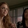 Holland Roden and Arden Cho in Teen Wolf (2011)