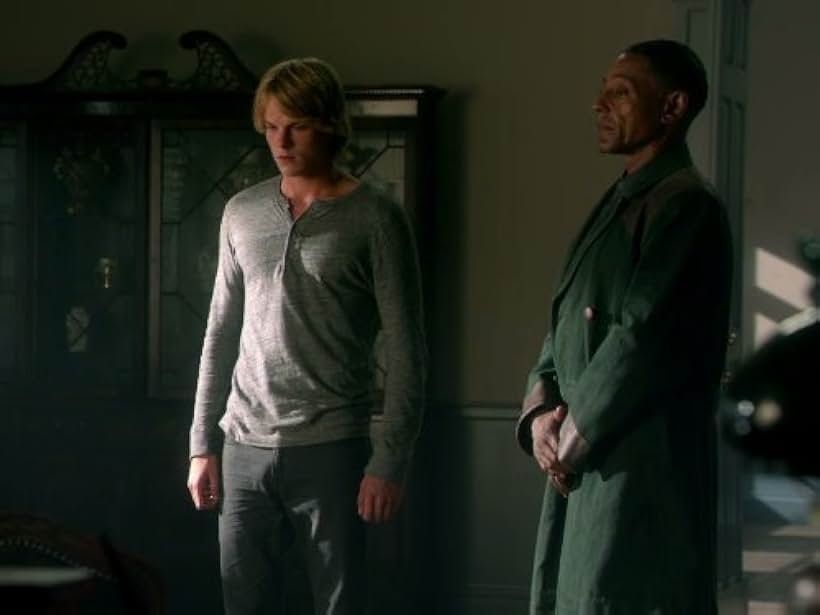 Giancarlo Esposito and Graham Rogers in Revolution (2012)