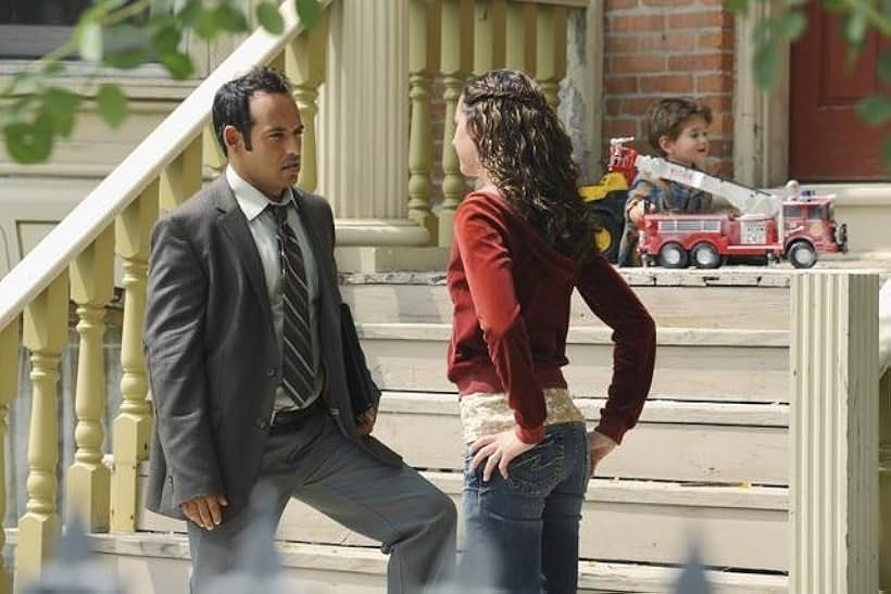 Shaun Majumder and Melissa Bowers in Detroit 1-8-7 (2010)