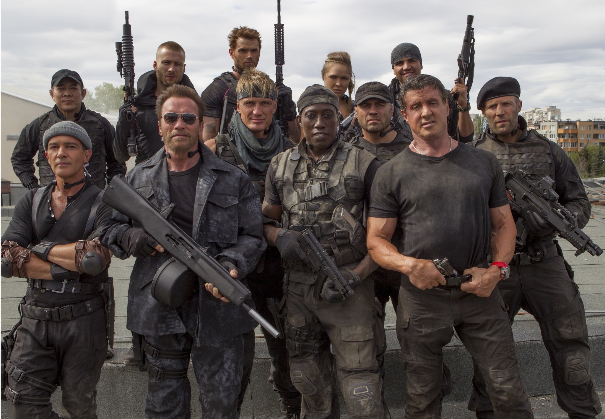 Antonio Banderas, Dolph Lundgren, Arnold Schwarzenegger, Sylvester Stallone, Wesley Snipes, Jet Li, Jason Statham, Randy Couture, Glen Powell, Kellan Lutz, Ronda Rousey, and Victor Ortiz in The Expendables 3 (2014)