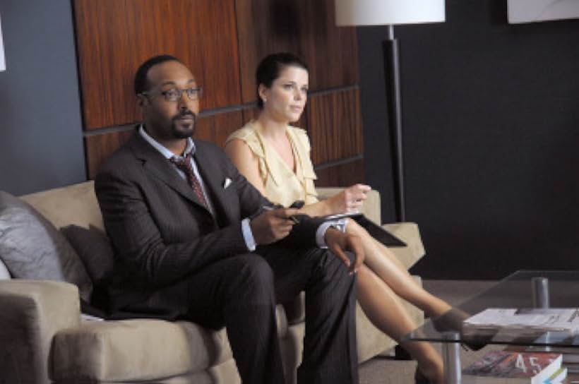 Neve Campbell and Jesse L. Martin in The Philanthropist (2009)