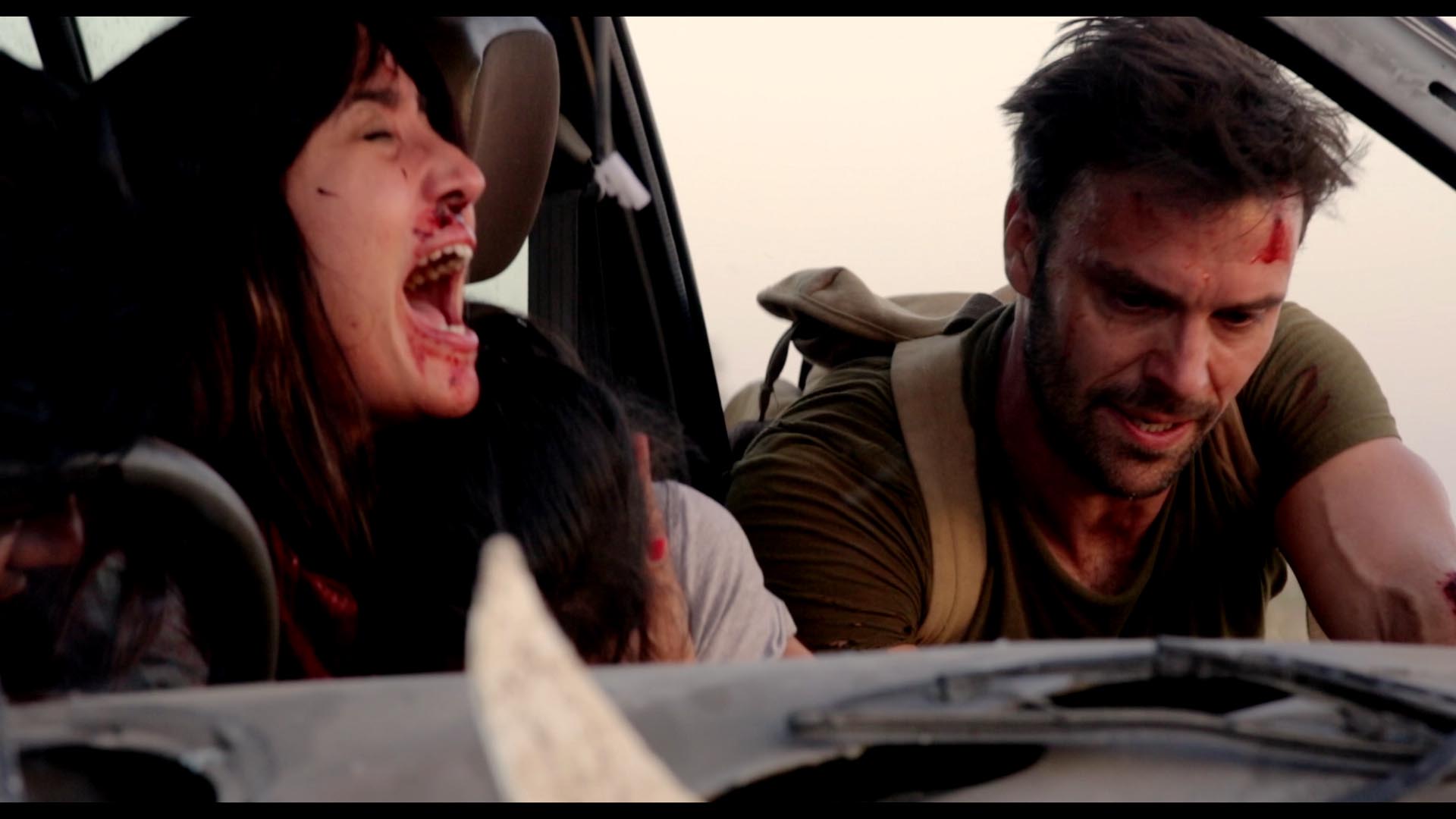 Joseph Millson and Madhu Rajesh in The Dead 2: India (2013)