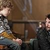 Noah Wyle and Maxim Knight in Falling Skies (2011)