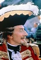 John Neville in The Adventures of Baron Munchausen (1988)