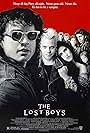 Jami Gertz, Corey Haim, Jason Patric, Kiefer Sutherland, Brooke McCarter, Alex Winter, and Billy Wirth in The Lost Boys (1987)