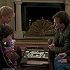 Robin Williams, Kirsten Dunst, Bonnie Hunt, and Bradley Pierce in Jumanji (1995)