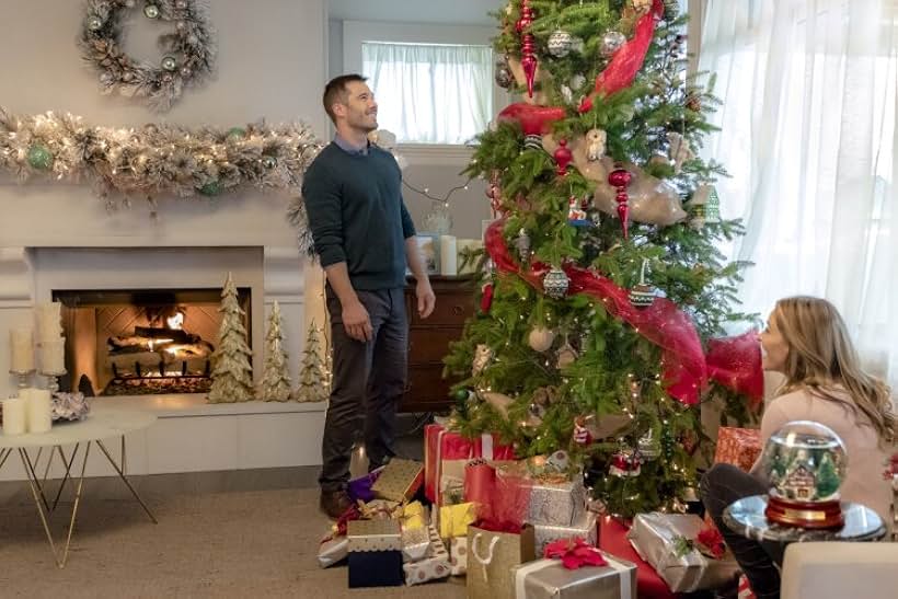 Jill Wagner and Luke Macfarlane in Karen Kingsbury's Maggie's Christmas Miracle (2017)