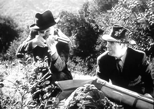 Arthur Kennedy and Noel Madison in Highway West (1941)