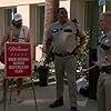 Carlos Alazraqui and Cedric Yarbrough in Reno 911! (2003)