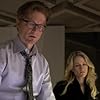 Eric Stoltz and Paula Malcomson in Caprica (2009)