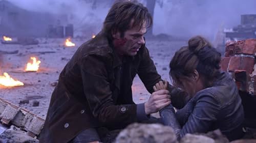 Daniella Alonso and Billy Burke in Revolution (2012)