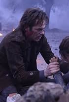 Daniella Alonso and Billy Burke in Revolution (2012)