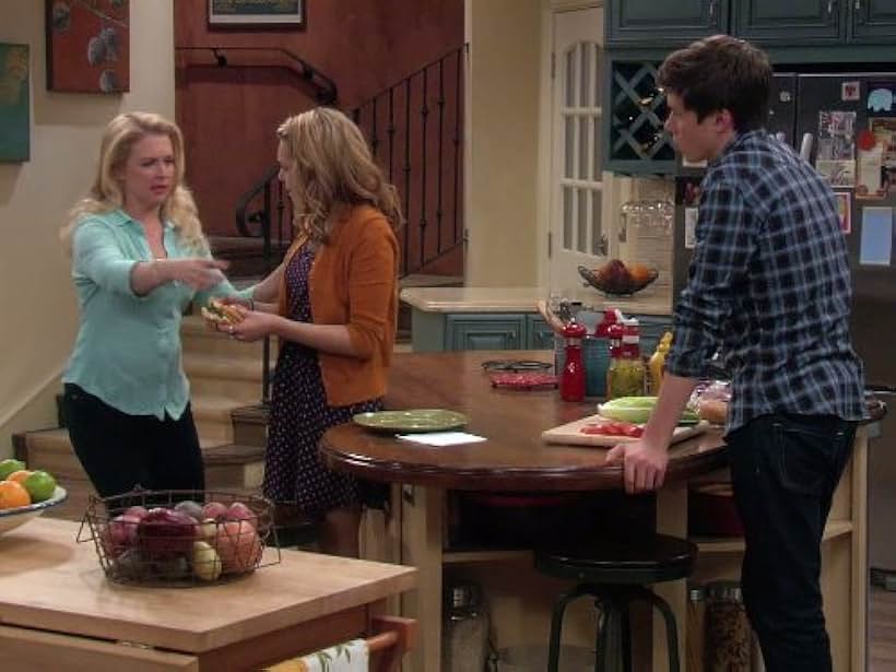 Melissa Joan Hart and Nick Robinson in Melissa & Joey (2010)