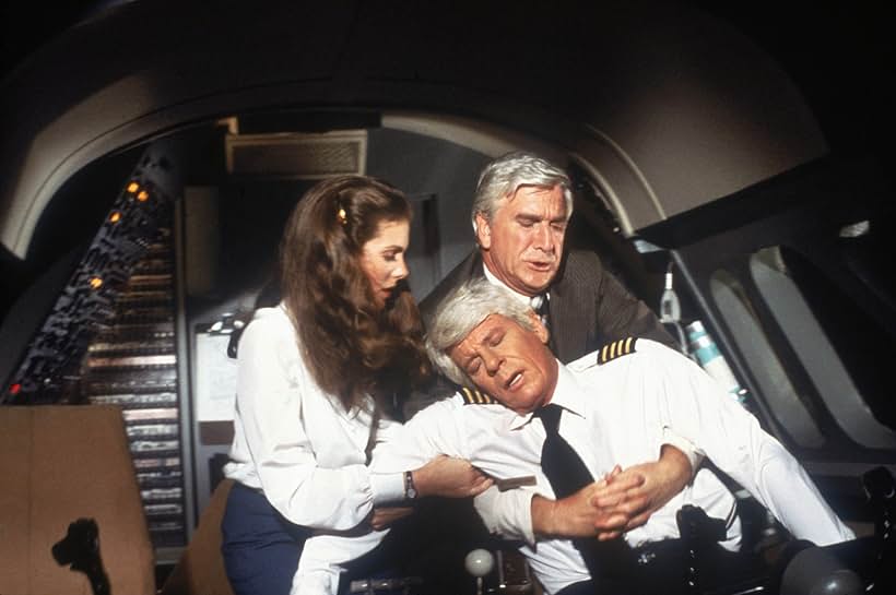 Leslie Nielsen, Peter Graves, and Julie Hagerty in Airplane! (1980)