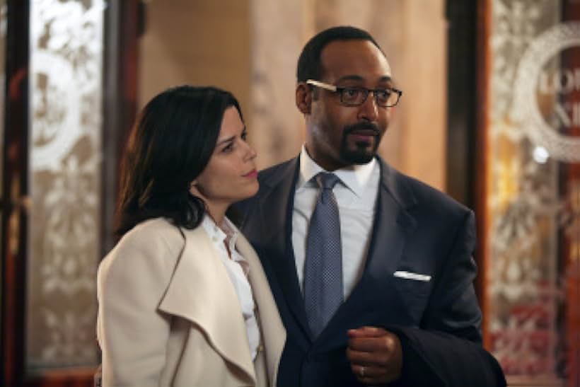 Neve Campbell and Jesse L. Martin in The Philanthropist (2009)