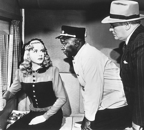 Deanna Durbin, Joseph Crehan, and Sam McDaniel in Lady on a Train (1945)