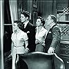 Leo G. Carroll, Farley Granger, Patricia Hitchcock, and Ruth Roman in Strangers on a Train (1951)