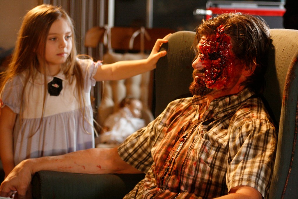 Caitlin Carmichael and Don Swayze on set of feature film "Lizzie" January 2010