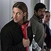 Brad Pitt, Pierfrancesco Favino, and Daniella Kertesz in World War Z (2013)