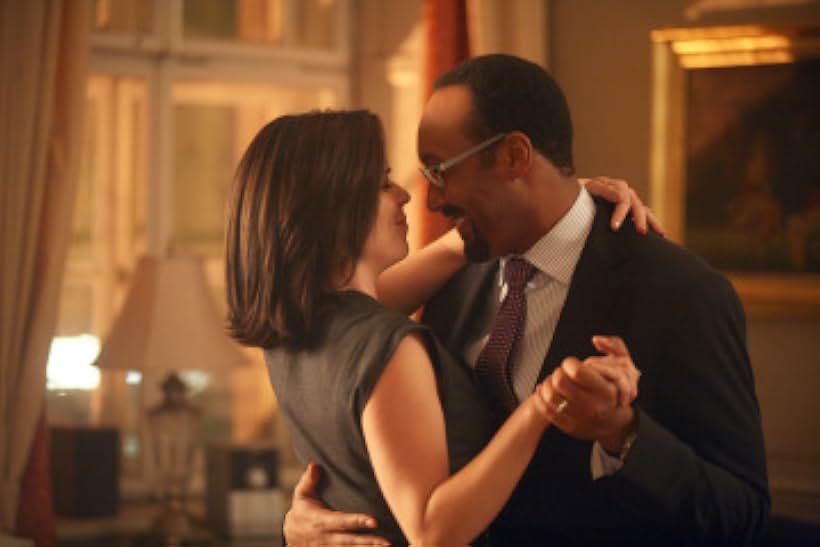 Neve Campbell and Jesse L. Martin in The Philanthropist (2009)