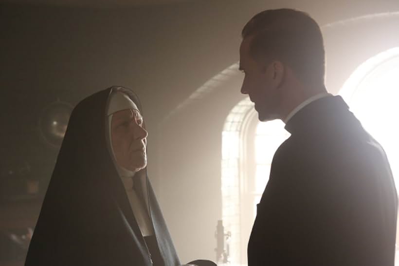 Joseph Fiennes and Barbara Tarbuck in American Horror Story (2011)