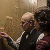 Gary Oldman and Lily James in Darkest Hour (2017)