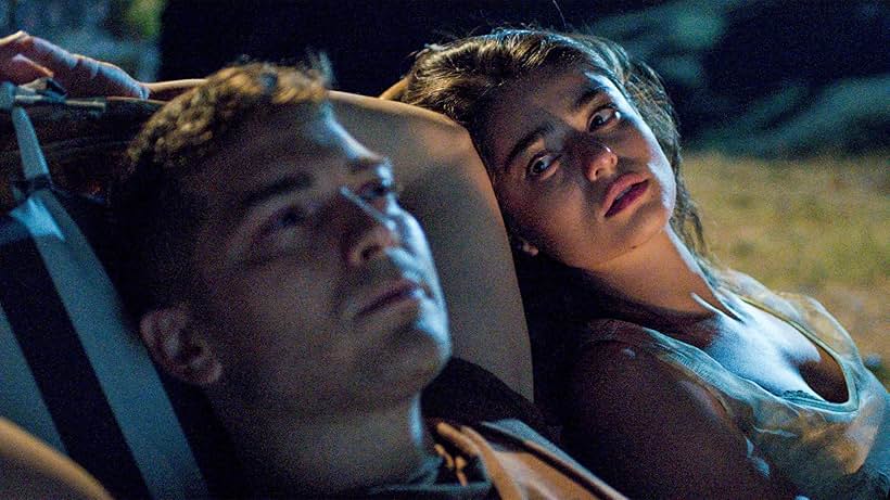 Çagatay Ulusoy and Ayça Aysin Turan in The Protector (2018)