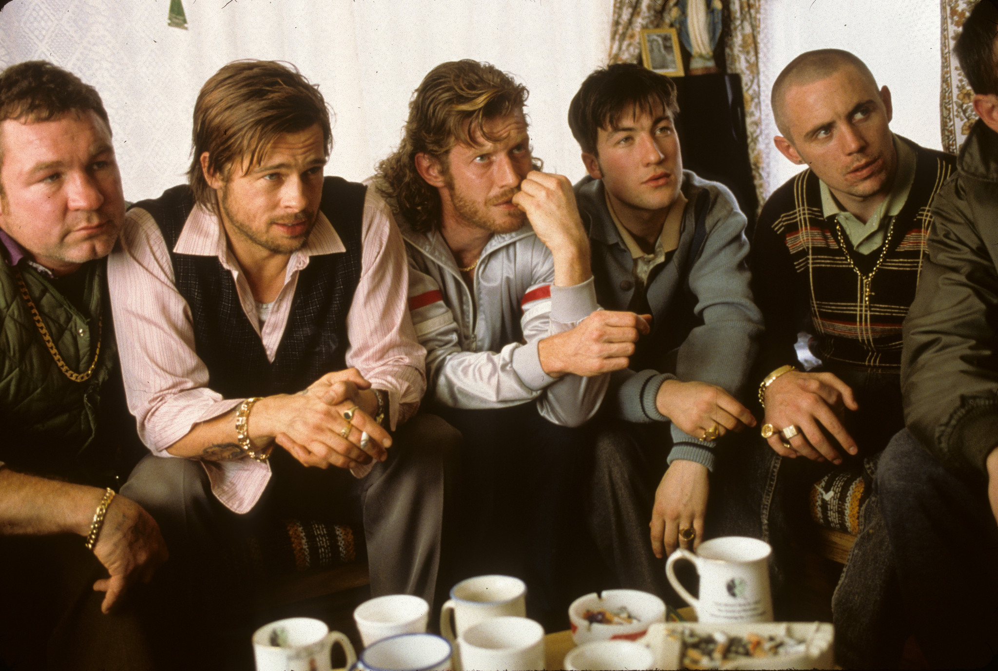 Brad Pitt, Jason Flemyng, Michael Hughes, and Liam McMahon in Snatch (2000)