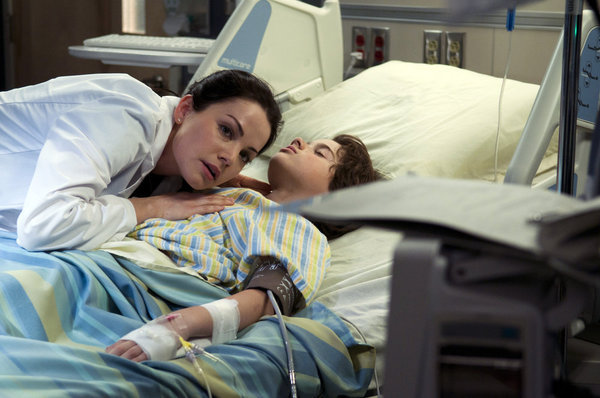 Erica Durance and Jake Goodman in Saving Hope (2012)