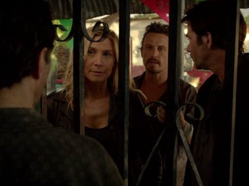 Billy Burke, Elizabeth Mitchell, and David Lyons in Revolution (2012)