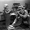 Harold Lloyd and Buster Phelps in Feet First (1930)