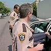 Carlos Alazraqui and Cedric Yarbrough in Reno 911! (2003)