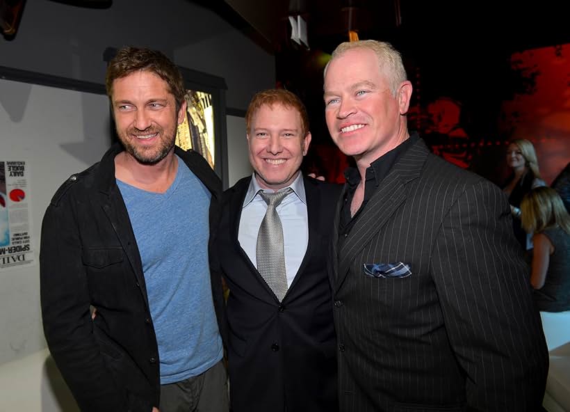 Actor Gerard Butler, Relativity Media CEO Ryan Kavanaugh and actor Neal McDonough attend Relativity Media's "Movie 43" Los Angeles Premiere After Party held at Madame Tussauds Hollywood on January 23, 2013 in Hollywood, California.