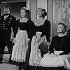 Bibi Andersson, Oscar Ljung, Birgitta Pettersson, and Sif Ruud in Ansiktet (1958)