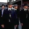 Val Kilmer, Bill Paxton, Sam Elliott, and Kurt Russell in Tombstone (1993)