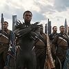 Chris Evans, Chadwick Boseman, Sebastian Stan, Jeremy Sample, Winston Duke, and Dawit Gulilat in Avengers: Infinity War (2018)