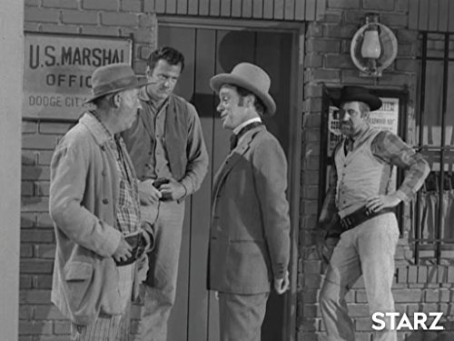 James Arness, Robert Gist, J. Pat O'Malley, and Harry Townes in Gunsmoke (1955)