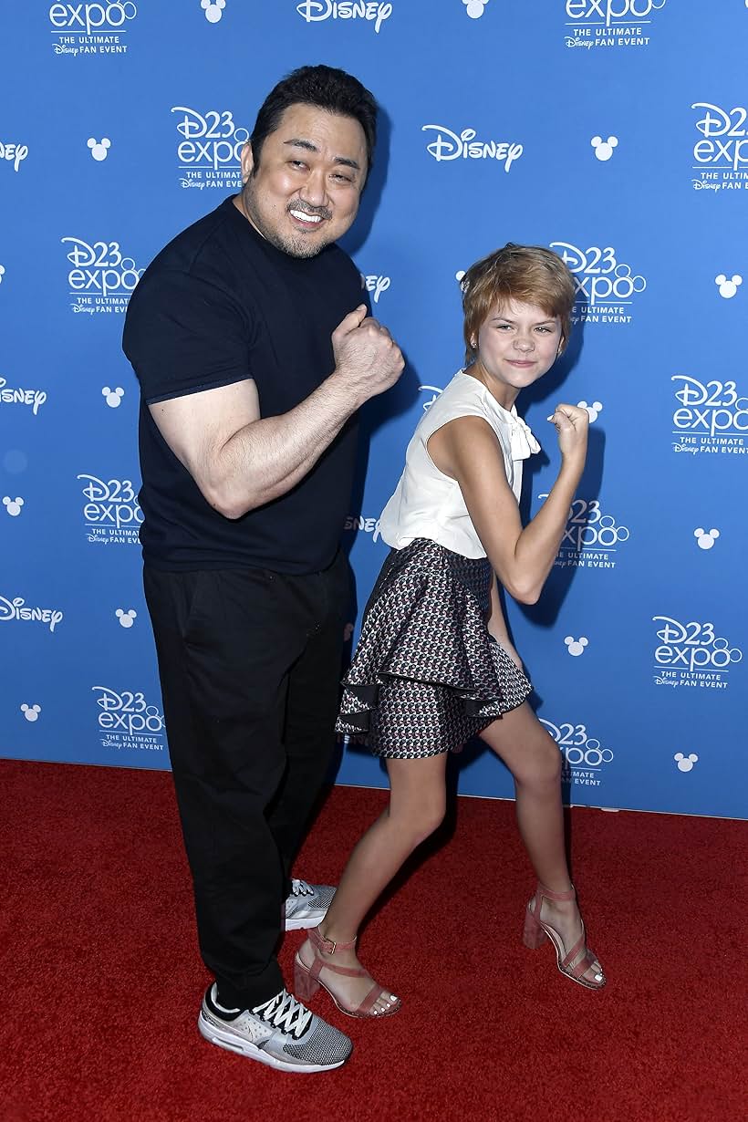 Ma Dong-seok and Lia McHugh at an event for Eternals (2021)