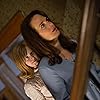 Elizabeth Reaser and Lulu Wilson in Ouija: Origin of Evil (2016)